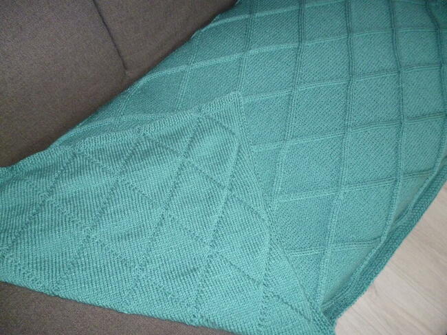 Narzuta na kanapę lub wersalkę.