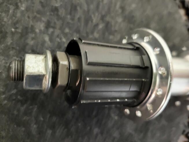 Piasta koła tył Dahon 20, 7 rzędów.