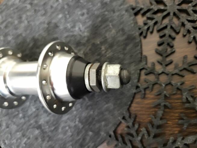 Piasta koła tył Dahon 20, 7 rzędów.