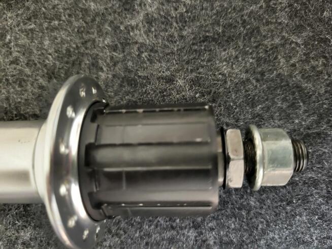 Piasta koła tył Dahon 20, 7 rzędów.