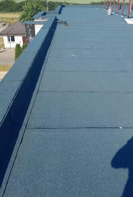 Dekarz .Dachy płaskie z technologii pap termozgrzewalnych.