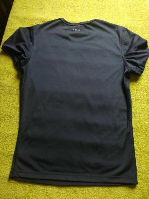 Bluzka sportowa Nike. 8/9 lat.