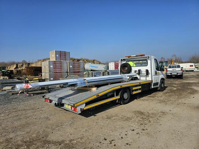 usługi transportowe Leszno - auto laweta