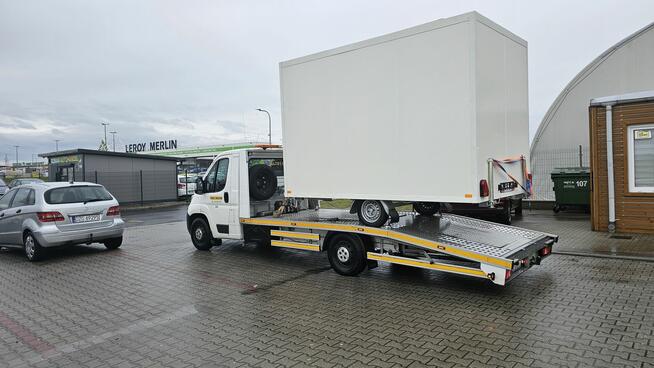 usługi transportowe Leszno - auto laweta