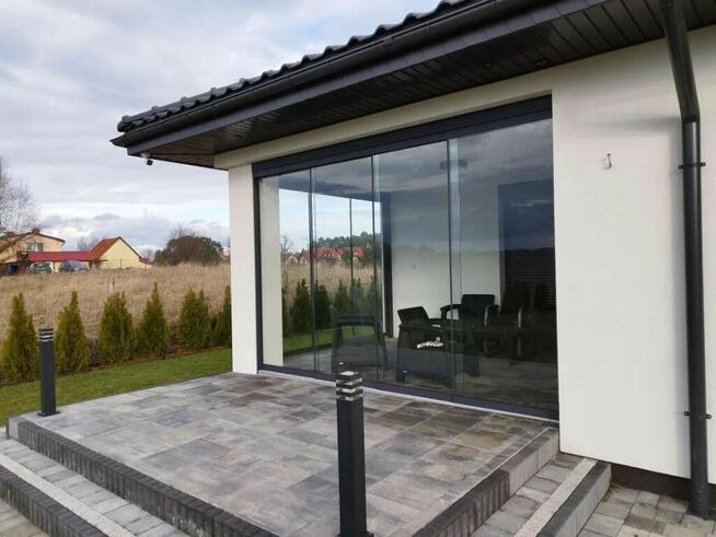 Systemowa zabudowa ściany przesuwnej szklanej do tarasu