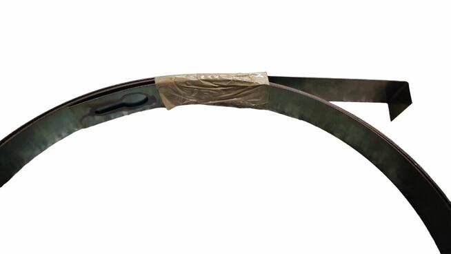 Sprężyna naciągu osłony sań poprzecznych szlifierki SPC-20