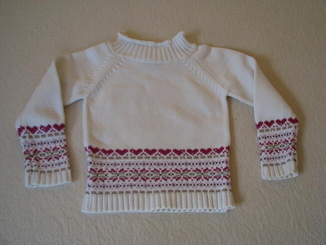 Biały sweterek dziecięcy z pasem wzorów, rozm. 104, Topolino