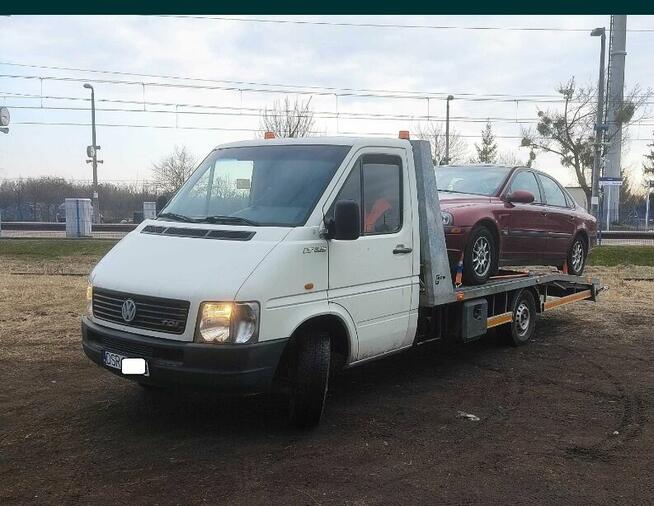 Autolaweta laweta transport samochodowy pomoc drogowa holowa