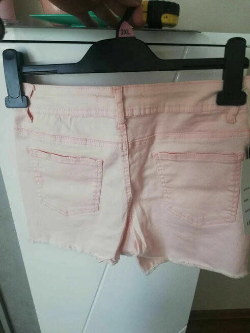 Spodenki elastyczne pudrowy róż z dziurami