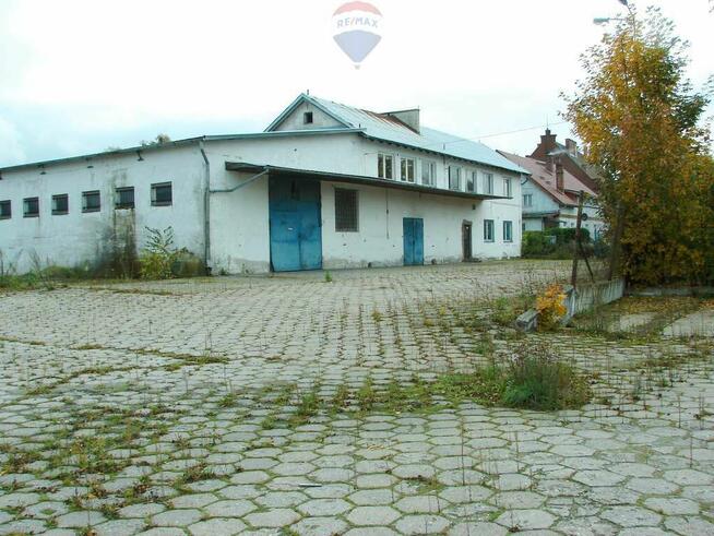 Duży magazyn z placem i biurami w Malborku.