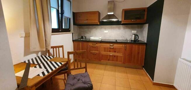 kawalerka z tarasem i ogródkiem na Woli