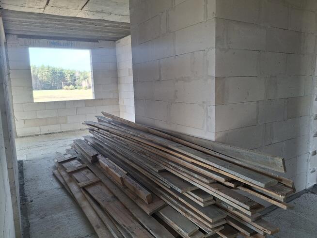 Działka budowlana z domem w stanie surowym