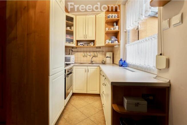 Dom szeregowy + lokal handlowo - usługowy