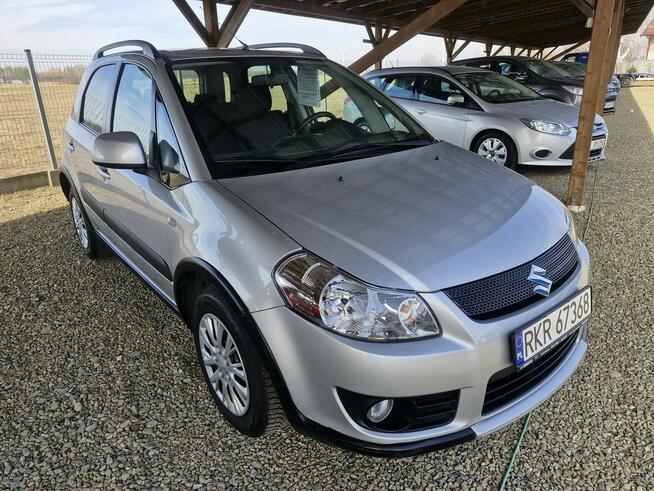 Suzuki SX4 1.6B *DANCE* nawigacja grz. fotel klimatronik alu 4x2 NIEMCY ładny