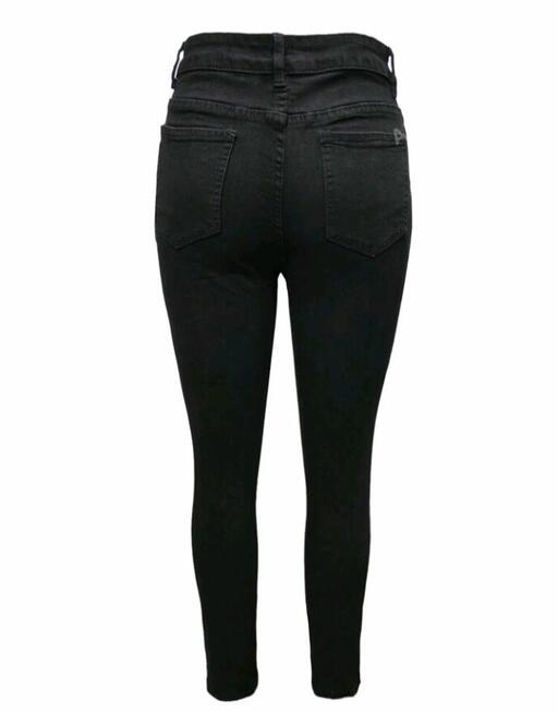 Damskie obcisłe dżinsy z wycięciami, z przetarciami i kiesze