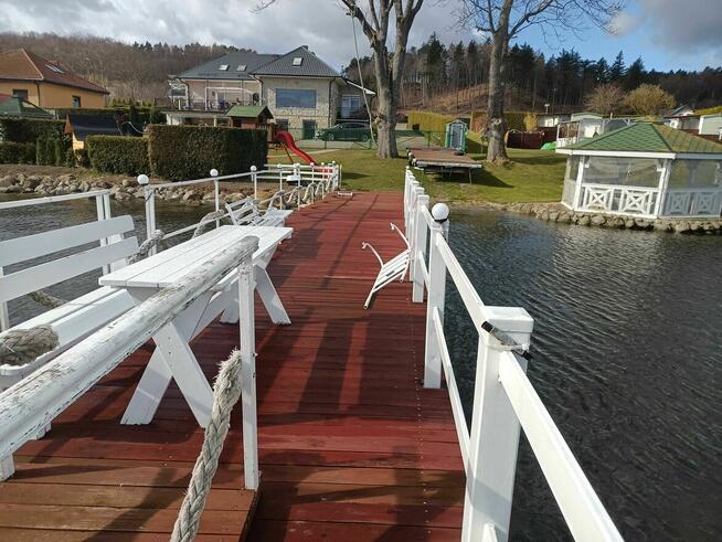 Dom z własną linią brzegową prywatnym pomostem i slip