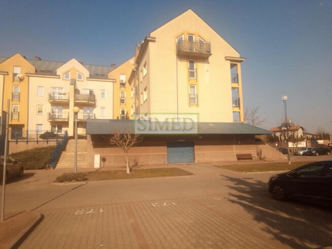 Miejsce parkingowe w garażu