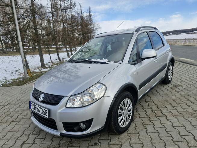 Suzuki SX4 1.6B nawigacja grz. fotel klimatronik alu 4x2 NIEMCY TuV 2026 rej PL