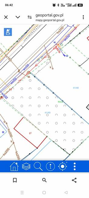 Działka w okolicy jezior i lasów.
