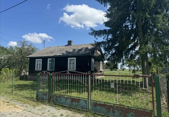 Dom drewniany na uroczej wsi, działka siedliskowa
