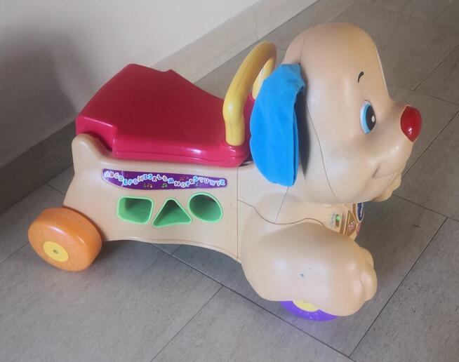 Chodzik - jeździk szczeniaczka uczniaczka .- ..Fisher-Price