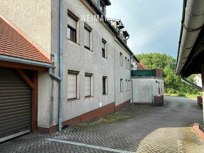 Kompleks kamienic pod domy lub mieszkania