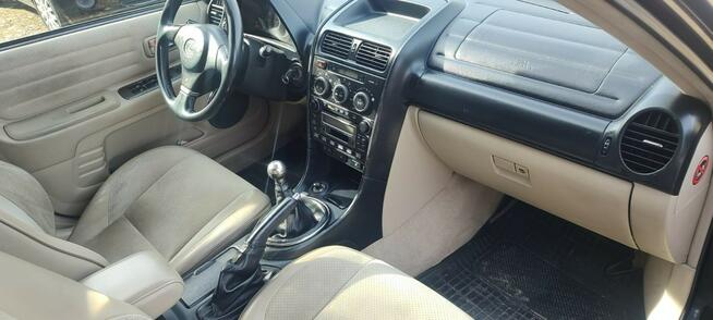 bardzo zadbany, bez korozji, niski przebieg