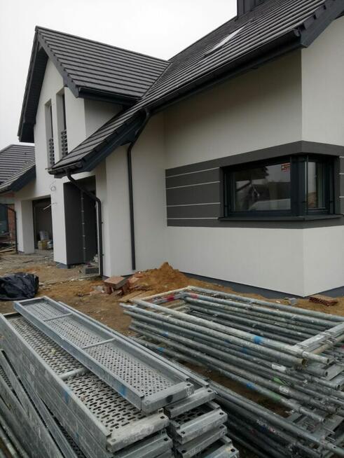 Praca przy elewacjach, dociepleniach