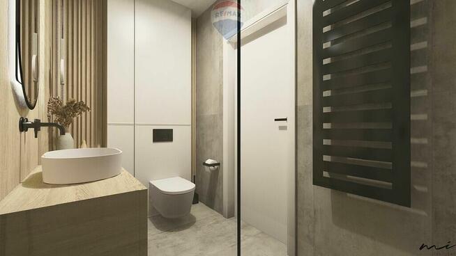 Dwupoziomowy apartament z prywatnym tarasem