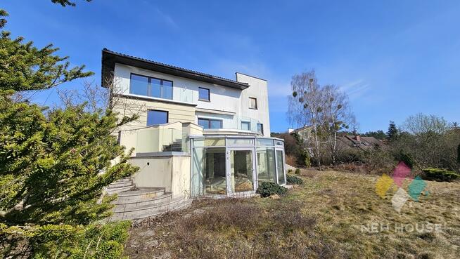 Dom wolnostojący z pięknym widokiem, garażem.