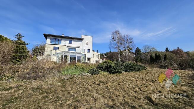 Dom wolnostojący z pięknym widokiem, garażem.