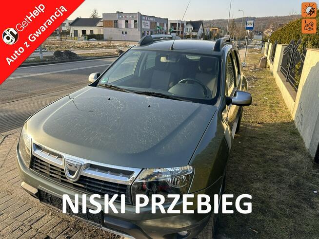 Dacia Duster Niezawodny silnik, klimatyzacja, bluetooth, isofix, opony wielosez.