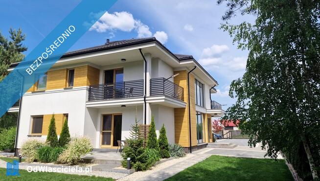 Modernistyczny dom nad jeziorem z funkcją pensjonatu