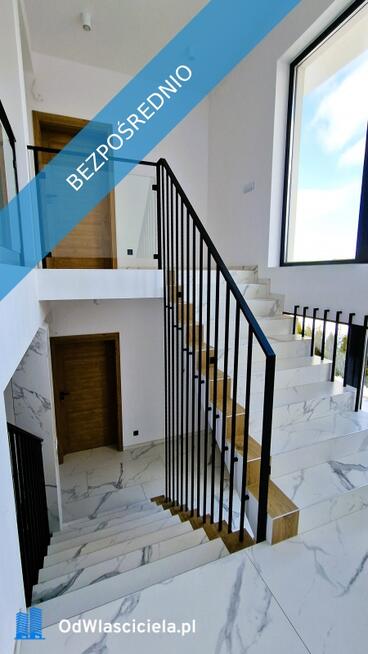 Modernistyczny dom nad jeziorem z funkcją pensjonatu