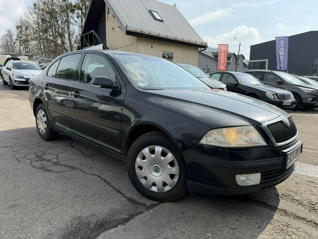 Škoda Octavia Klimatyzacja, Ele szyby 4x, Ele lusterka, Podłokietnik