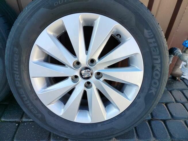 Alufelgi 5x100 z oponami letnimi Hankook.