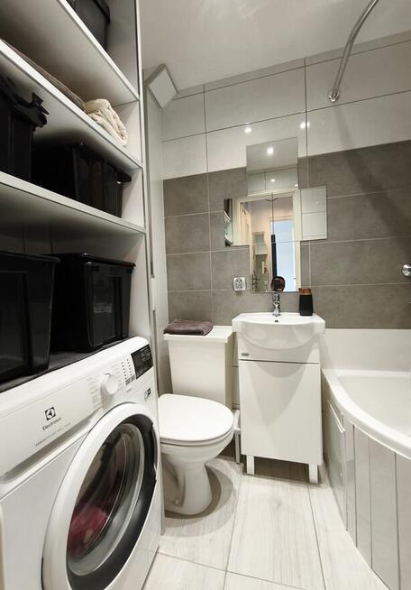 Atrakcyjna kawalerka z balkonem w dzielnicy Tysiąclecie