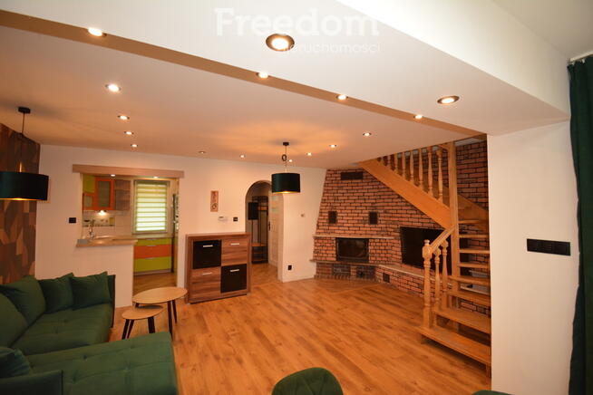 Dwupoziomowe mieszkanie z kominkiem – Gliwice