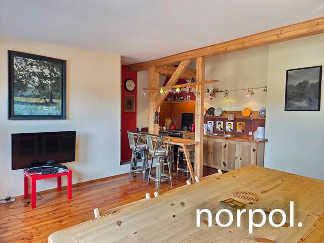 Stylowe mieszkanie w kamienicy przy Młynówce Królewskiej, ponad dachami innych