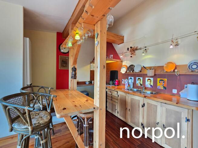 Stylowe mieszkanie w kamienicy przy Młynówce Królewskiej, ponad dachami innych