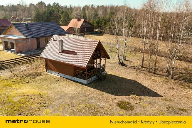 Drewniany domek 70 m² na działce 38 arów