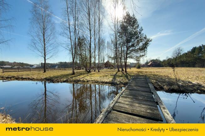 Drewniany domek 70 m² na działce 38 arów