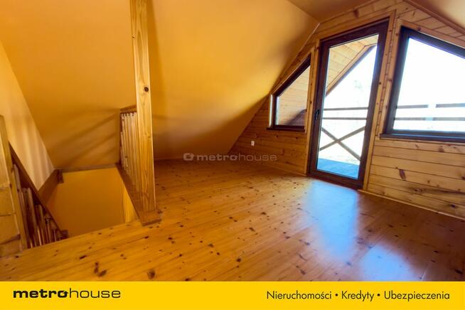 Drewniany domek 70 m² na działce 38 arów