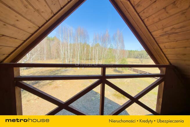 Drewniany domek 70 m² na działce 38 arów