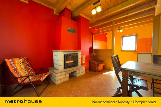 Drewniany domek 70 m² na działce 38 arów