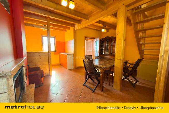 Drewniany domek 70 m² na działce 38 arów