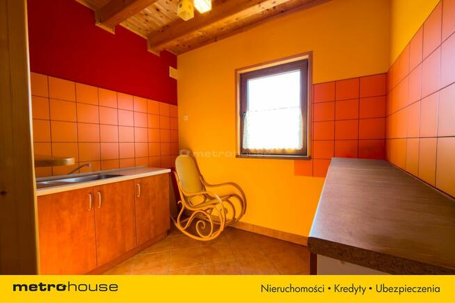 Drewniany domek 70 m² na działce 38 arów