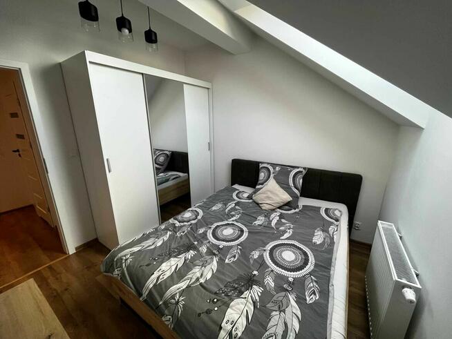 Wynajmę mieszkanie 35 m² – 2 pokoje, balkon, miejsce postojowe