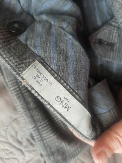 Sprzedam prawie nowe spodnie męskie i bluzę