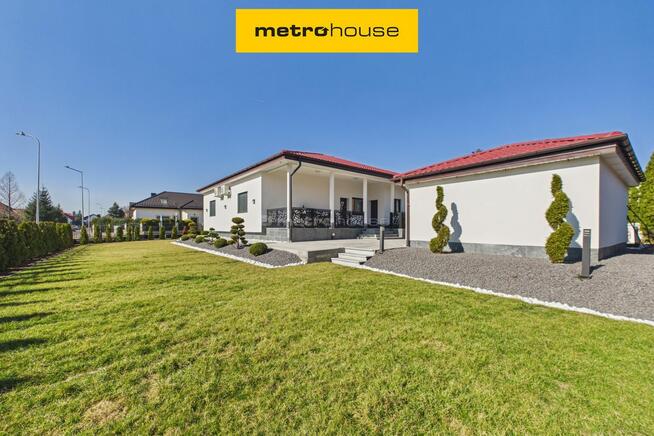 Przestronny dom z zadbanym ogrodem i garażem